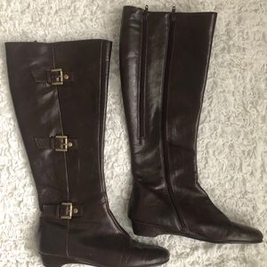 Dark brown tall boots with gold buckle detail